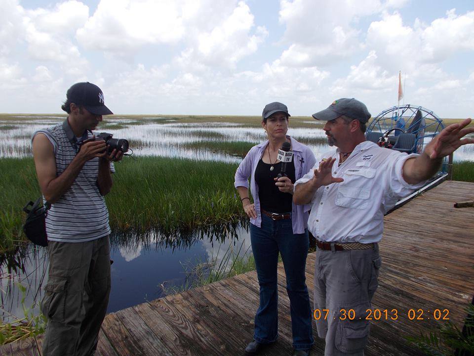 Ride The Wind staff being interviewed by a reporter